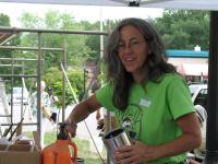 Local Walldog Lead, Carole Bersin, mixes paint